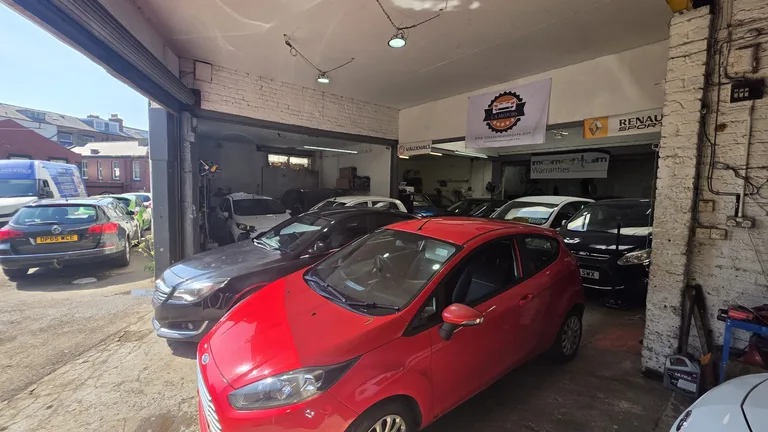 Inside the L.A Motors garage in Scarborough